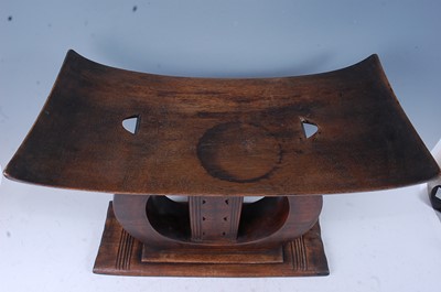 Lot 151 - A large carved hardwood "Elders" type stool,...