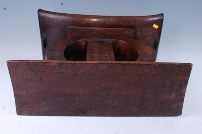Lot 151 - A large carved hardwood "Elders" type stool,...
