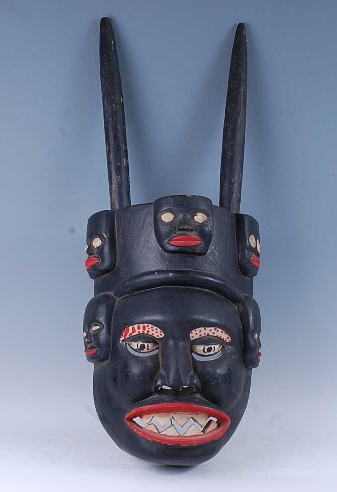 Lot 152 - A large African ritual mask, having two horns...