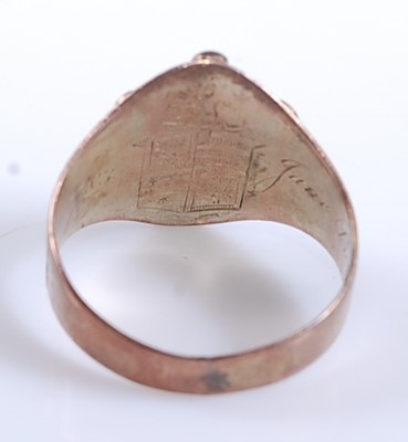 Lot 2546 - A yellow metal mourning ring in the form of an...