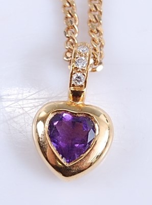 Lot 2557 - An 18ct yellow gold, amethyst and diamond...