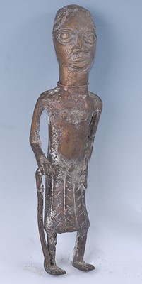 Lot 160 - A cast brass elder figure, modelled in...