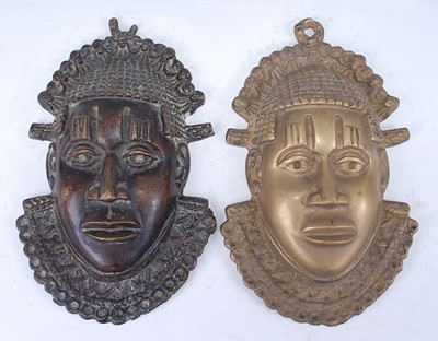 Lot 164 - A cast copper alloy mask, having a decorative...