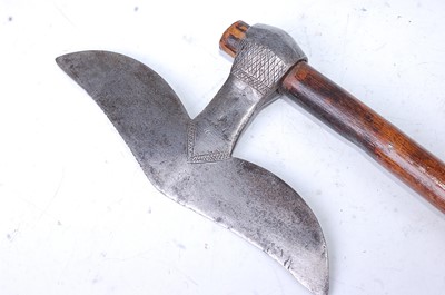 Lot 287 - A Bulova war axe, having a typical shaped...