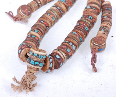 Lot 288 - A Nepalese beaded necklace, each disc shaped...