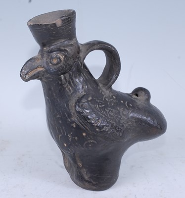 Lot 343 - A blackware pottery vessel in the form of a...