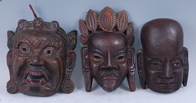 Lot 290 - A carved wooden mask with polychrome painted...