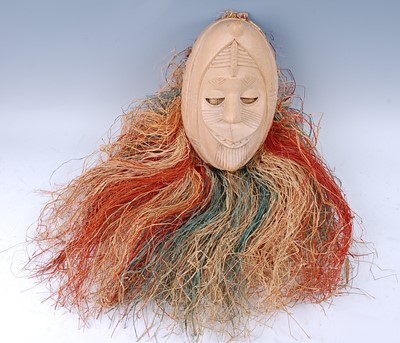 Lot 178 - A carved wooden African dance mask, having a...