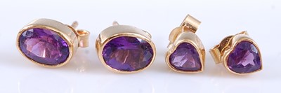 Lot 2564 - Two pairs of yellow metal amethyst stud...