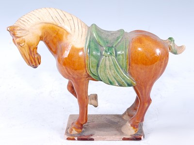 Lot 302 - A Chinese hollow moulded model of a Tang horse...