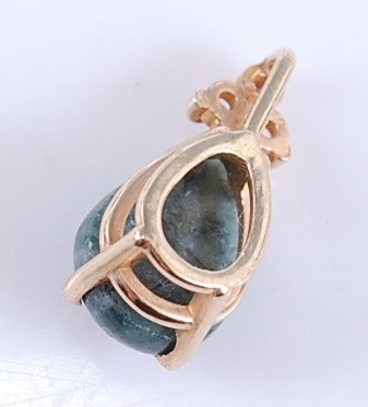 Lot 2565 - A yellow metal, jadeite and diamond pendant...