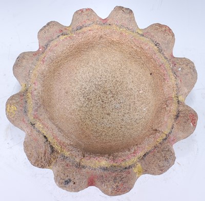Lot 130 - A carved stone mortar, the deep circular bowl...