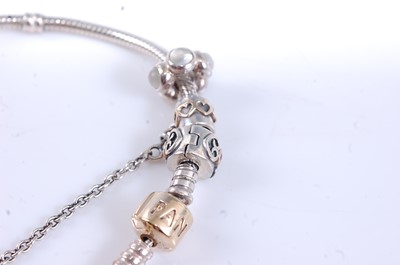 Lot 2579 - A sterling silver and 14ct yellow gold Pandora...