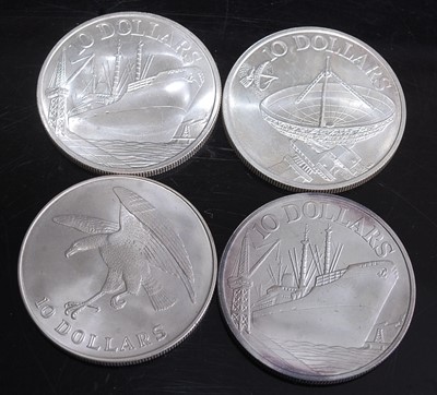 Lot 2201 - Singapore, a collection of four silver...