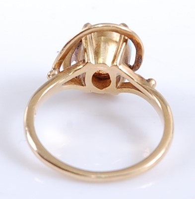 Lot 2573 - A yellow metal opal dress ring, comprising an...