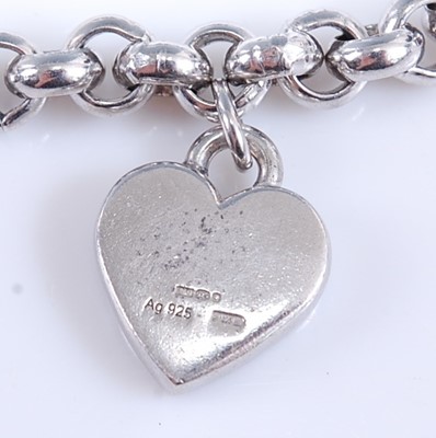 Lot 2574 - A Gucci sterling silver charm bracelet, with a...