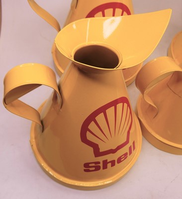 Lot 8 - A set of five Shell Petroleum graduated oil...