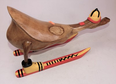 Lot 17 - A carved bamboo model of a duck wearing red...