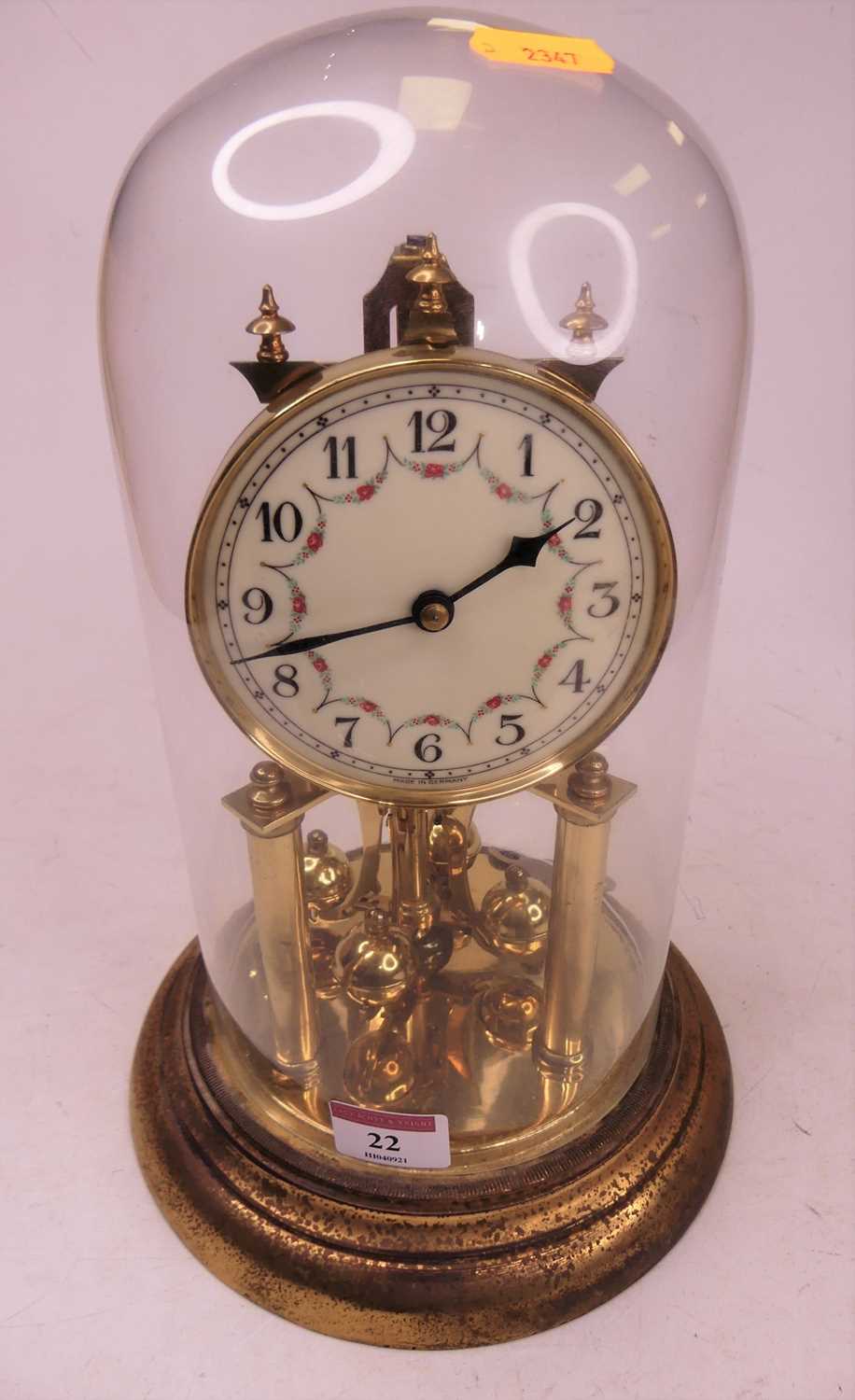 Lot 22 - A 20th century brass anniversary clock, housed...