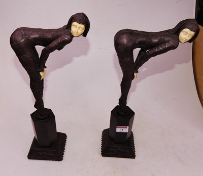 Lot 31 - A pair of Art Deco style resin figures of...