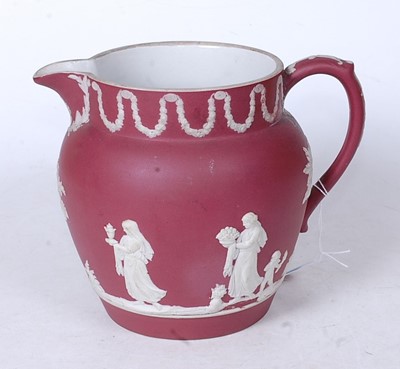 Lot 34 - A Wedgwood crimson Jasperware jug, circa 1870,...