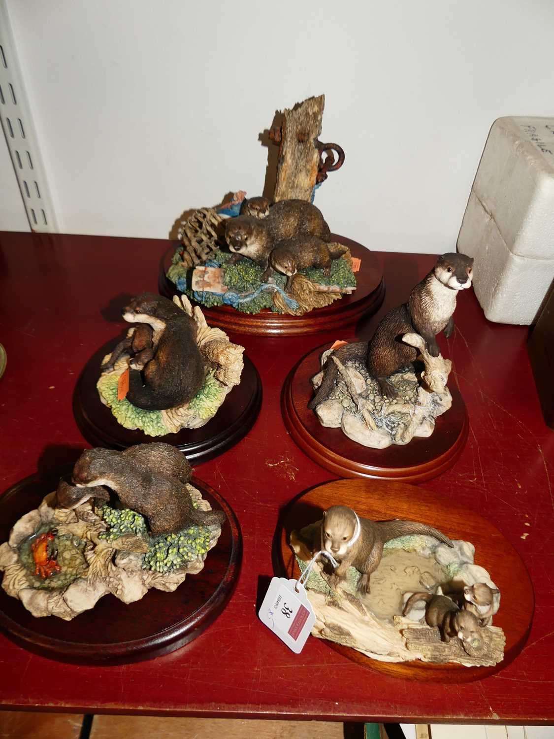 Lot 38 - A Border Fine Arts resin model of two otters...