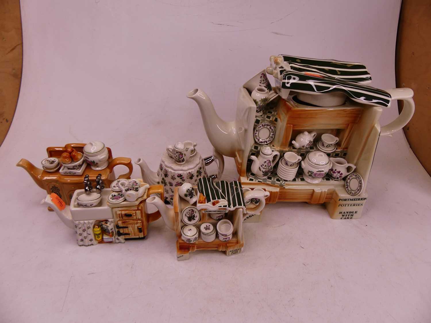 Lot 42 - A Portmeirion China Stall teapot, h.20cm;...