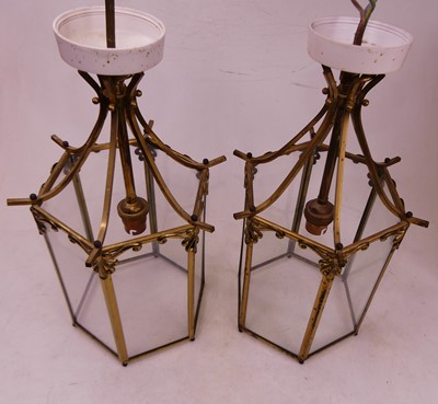 Lot 61 - A pair of 20th century brass and glass ceiling...