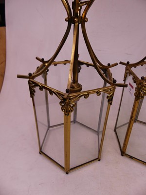 Lot 61 - A pair of 20th century brass and glass ceiling...