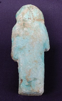 Lot 371 - An Egyptian brush decorated green glazed...