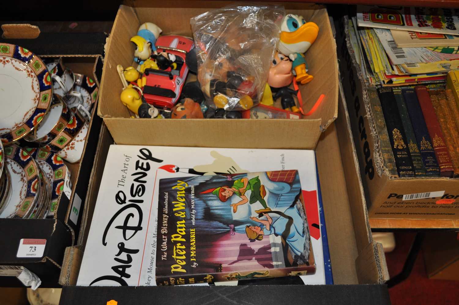 Lot 74 - A box containing a collection of Disney...