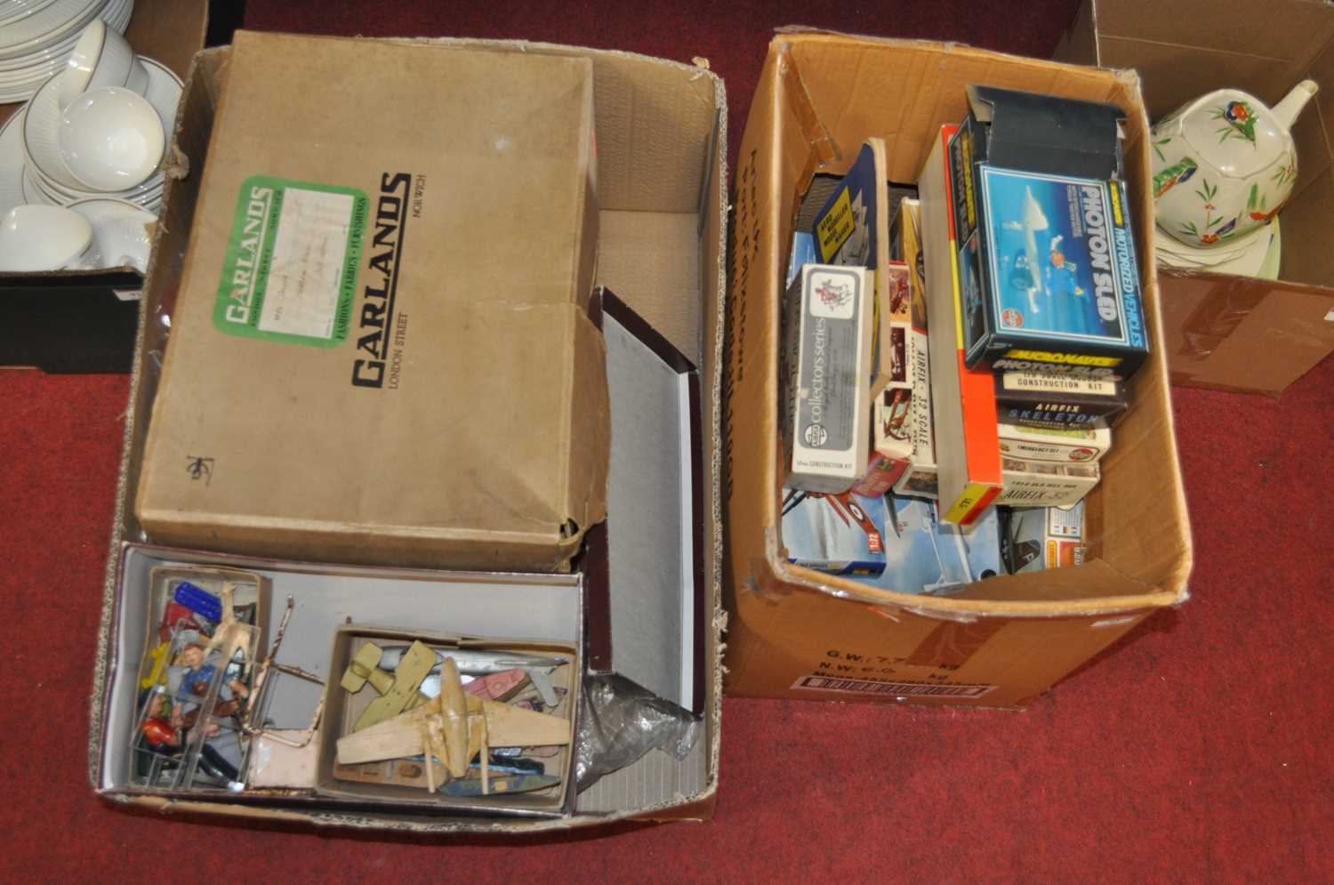 Lot 93 - Two boxes containing various model kits, to...
