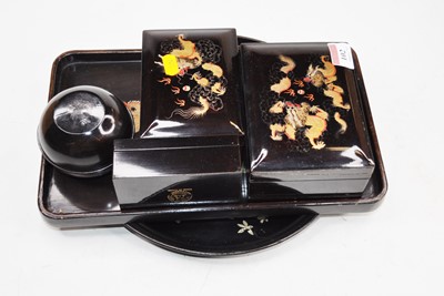 Lot 102 - A collection of Japanese gilt decorated black...