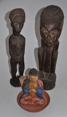 Lot 110 - A 20th century African carved hardwood...