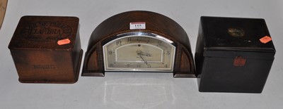 Lot 115 - A 1930s oak cased Smith's electric mantel...