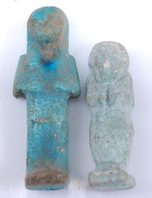 Lot 377 - An Egyptian blue faience shabti figure, carved...