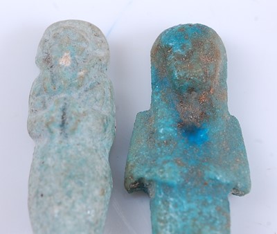 Lot 377 - An Egyptian blue faience shabti figure, carved...