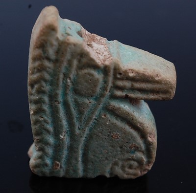 Lot 378 - A large Egyptian blue/green faience Eye of...