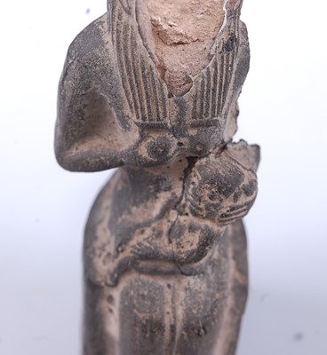 Lot 379 - An Egyptian moulded terracotta figure of the...