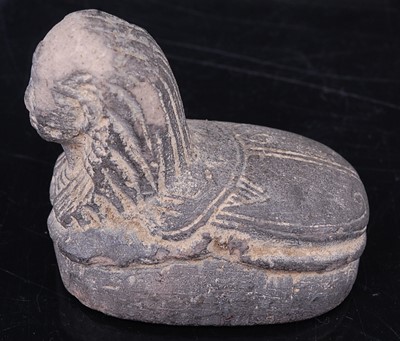 Lot 388 - An Egyptian moulded and tooled terracotta seal,...