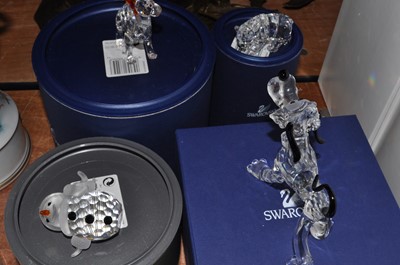 Lot 147 - A collection of Swarovski cut crystal animal...