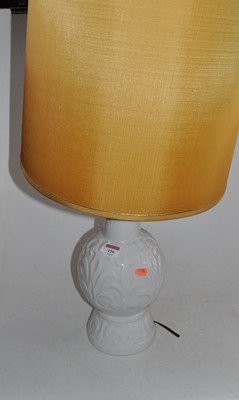 Lot 156 - A Blanc-de-Chine ceramic table lamp with shade,...