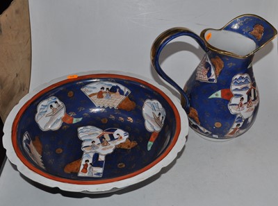 Lot 165 - A 20th century wash-jug and bowl, on a blue...