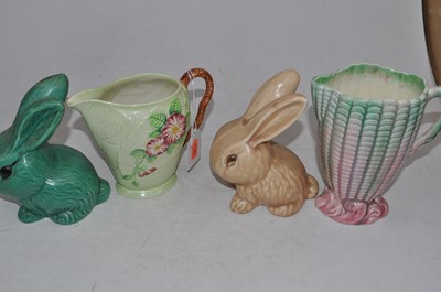 Lot 198 - A pair of Sylvac rabbits, one in green glaze...