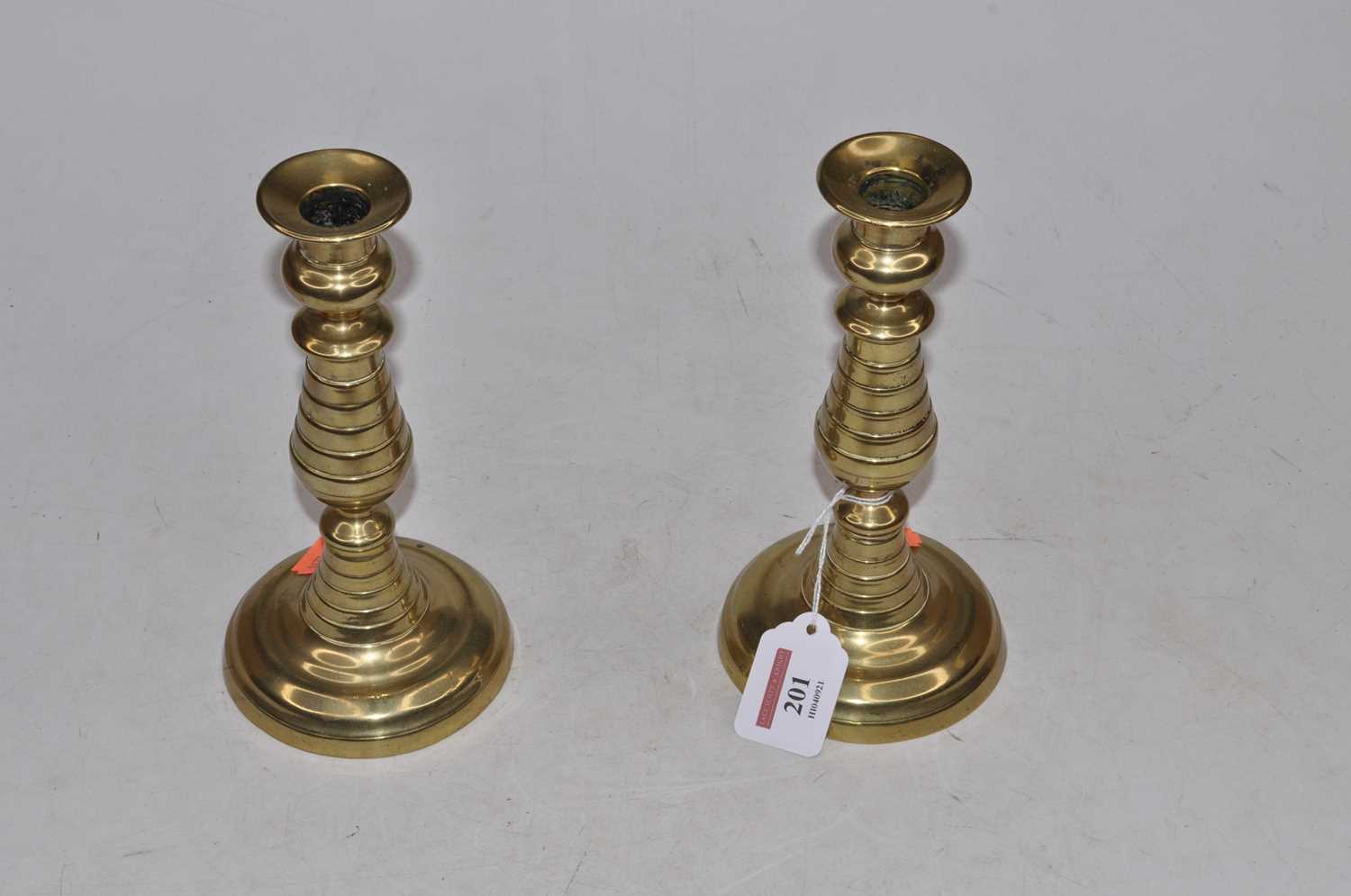 Lot 201 - A pair of 19th century turned brass...