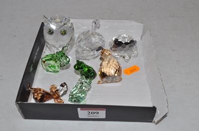 Lot 209 - A small collection of loose Swarovski crystal...
