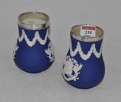 Lot 218 - A pair of Adams blue jasperware vases, each...