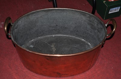 Lot 189 - A Victorian copper twin handled preserve pan...