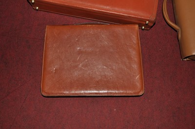 Lot 194 - A tan leather Gladstone bag by Filofax, a...