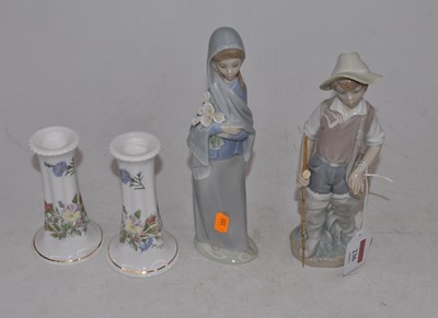 Lot 265 - A Lladro Spanish porcelain figure of a boy...